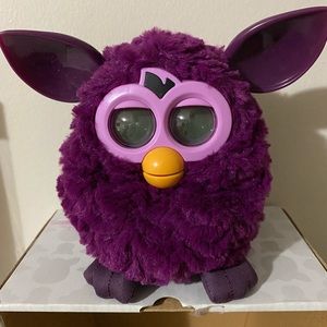 Purple furby complete with box, works excellent